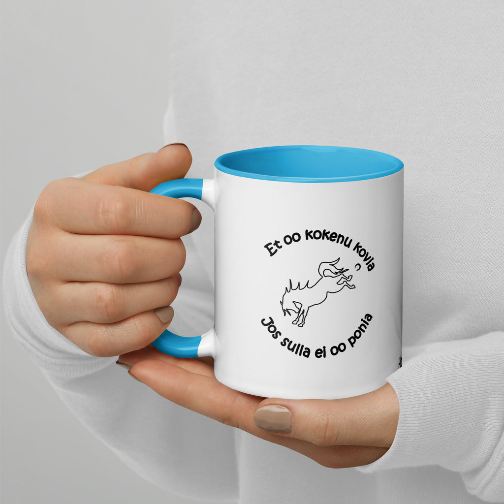 Värikäs keraaminen muki, jossa on teksti "et oo kokenut kovia, jos sulla ei oo ponia!"